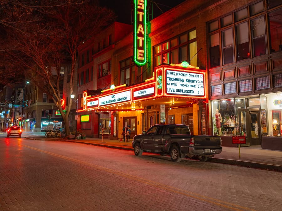 The State Theatre marquee in downtown Ithaca at night